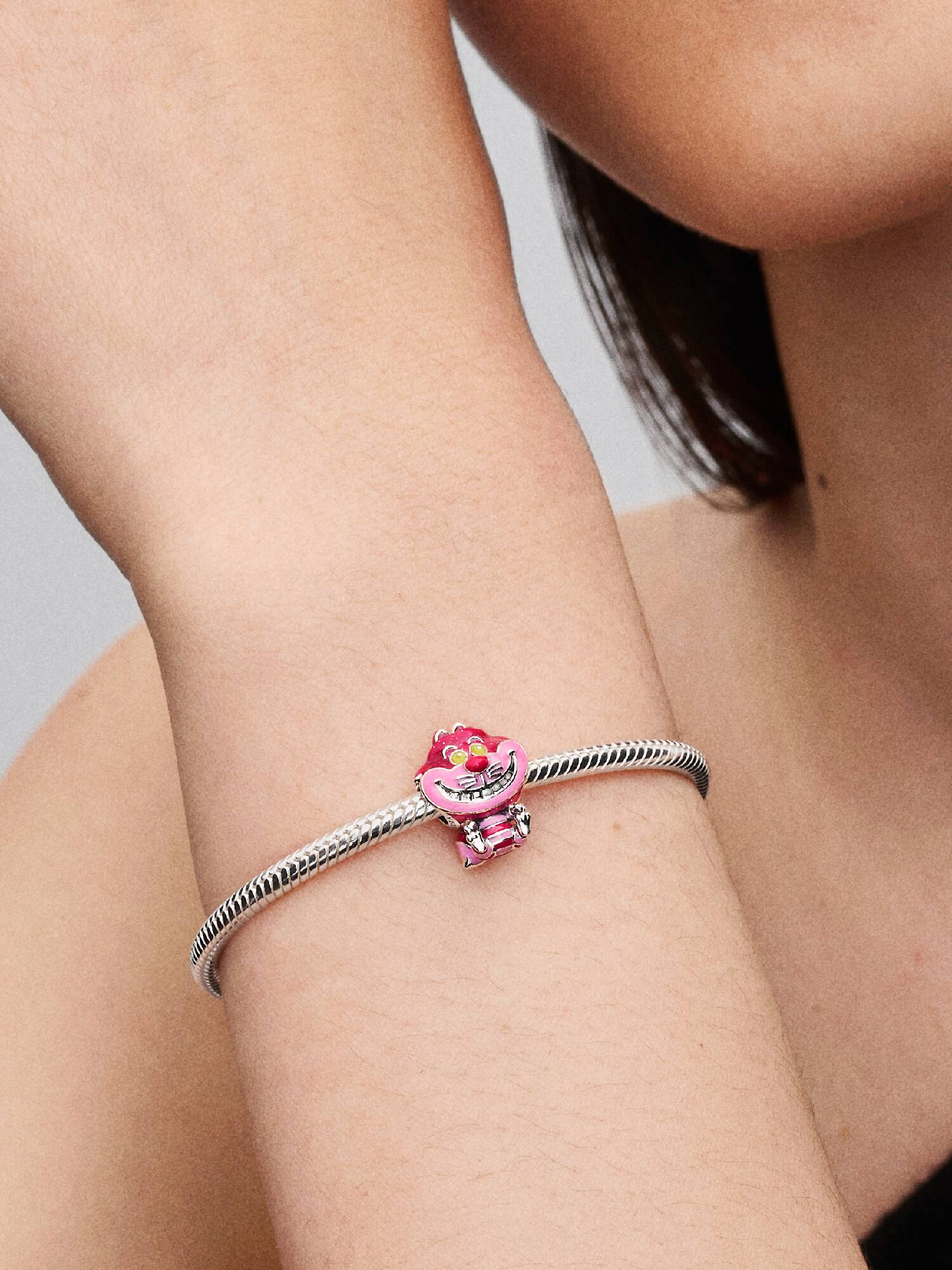 Disney Alice i Eventyrland, Filurkat Charm