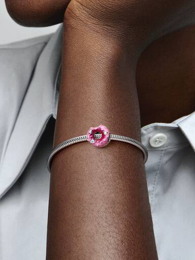 Glitrende Donut med krymmel charm